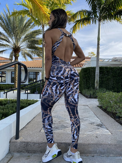 SCRUNCH BOOTY ZEBRA AND GOLD CHAIN JUMPSUIT